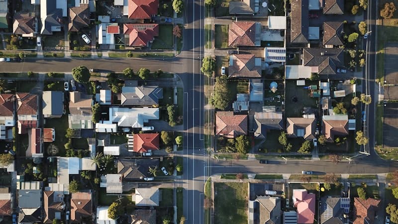 High-resolution satellite view of a neighborhood used for roof measurement